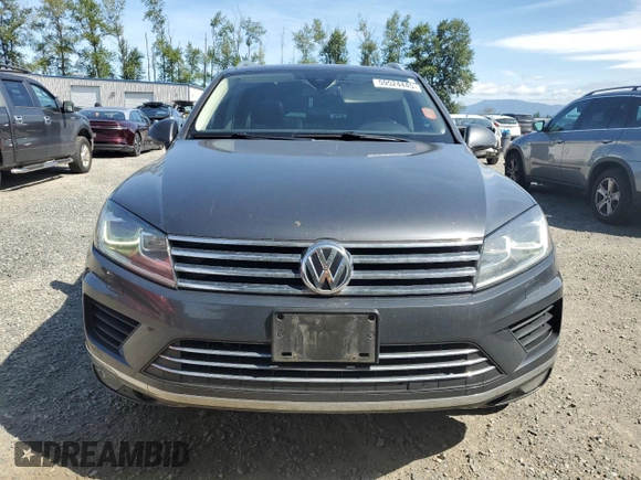 2015 Volkswagen Touareg Lux с VIN WVGEP9BP0FD006992, выставлен на аукционе Copart как лот 59524445 с пробегом 169 822 миль миль и Списание • Salvage title. История ставок и продаж доступна на DreamBid. Изображение 5.