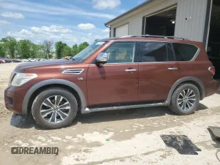 2018 Nissan Armada SL z VIN JN8AY2NC1J9551003, wystawiony jako Copart lot #55937465 z przebiegiem 149 851 mil mil oraz Szkoda całkowita • Salvage title. Historia ofert i sprzedaży dostępna na DreamBid. Obrazek 1.