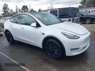 2022 Tesla Model Y Long Range with VIN 7SAYGDEE6NF461788, listed as a IAAI auction lot 41697064 with 34,034 mi miles and . Bid and sale history available at carsss.com. Image 1.