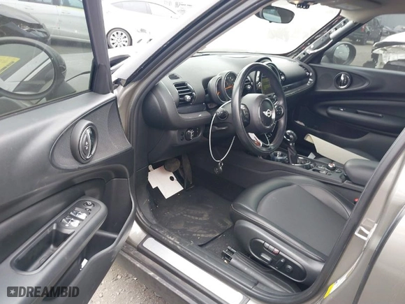 2016 MINI Cooper Clubman with VIN WMWLN5C56G2E30309, listed as a IAAI auction lot 41772501 with 67,584 mi miles. Bid and sale history available at carsss.com. Image 13.