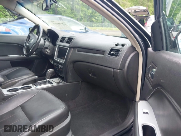 2010 Mercury Milan Premier with VIN 3MEHM0JG1AR602778, listed as a IAAI auction lot 42199080 with 163,158 mi miles and . Bid and sale history available at DreamBid. Image 5.