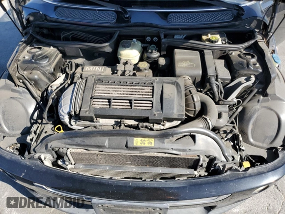 2005 MINI Convertible S z VIN WMWRH33415TF80610, wystawiony jako Copart lot #52642865 z przebiegiem 82 141 mil mil oraz Szkoda całkowita • Salvage title. Historia ofert i sprzedaży dostępna na DreamBid. Obrazek 12.