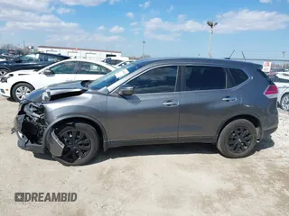 2015 Nissan Rogue S with VIN KNMAT2MVXFP527878, listed as a IAAI auction lot 41864389 with 87,305 mi miles and . Bid and sale history available at DreamBid. Image 14.