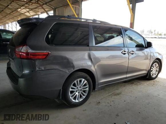 2016 Toyota Sienna XLE with VIN 5TDYK3DC5GS745451, listed as a Copart auction lot 63852525 with 161,578 mi miles and Salvage title. Bid and sale history available at DreamBid. Image 3.