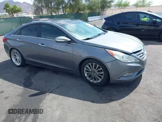 2012 Hyundai Sonata SE z VIN 5NPEC4AC3CH333474, wystawiony jako IAAI lot #42386615 z przebiegiem 122 463 mil mil oraz . Historia ofert i sprzedaży dostępna na DreamBid. Obrazek 1.