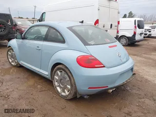 2012 Volkswagen Beetle 2.5L PZEV with VIN 3VWJP7AT0CM624851, listed as a IAAI auction lot 41364230 with 1 mi miles. Bid and sale history available at carsss.com. Image 3.