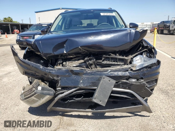 2018 Volkswagen Tiguan S with VIN 3VV1B7AXXJM069099, listed as a Copart auction lot 52345235 with 79,359 mi miles and Salvage title. Bid and sale history available at DreamBid. Image 5.
