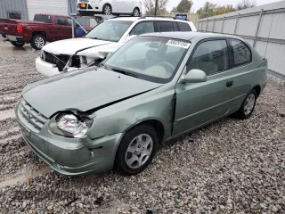 2003 Hyundai Accent GL with VIN KMHCG35C23U264701, listed as a Copart auction lot 80029154 with 142,090 mi miles and Salvage Title. Bid and sale history available at carsss.com. Image 1.