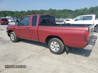 2000 Nissan Frontier XE with VIN 1N6DD26SXYC393054, listed as a Copart auction lot 62410125 with 106,319 mi miles and Salvage title. Bid and sale history available at DreamBid. Image 2.