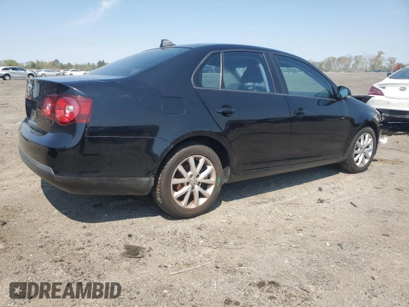 2010 Volkswagen Jetta S with VIN 3VWJX7AJ0AM010023, listed as a Copart auction lot 52379285 with 124,881 mi miles and Salvage title. Bid and sale history available at DreamBid. Image 3.