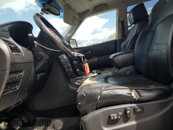 2011 Infiniti QX56 7-passenger with VIN JN8AZ2NE9B9003346, listed as a Copart auction lot 71543784 with 139,382 mi miles and Salvage Title. Bid and sale history available at carsss.com. Image 7.