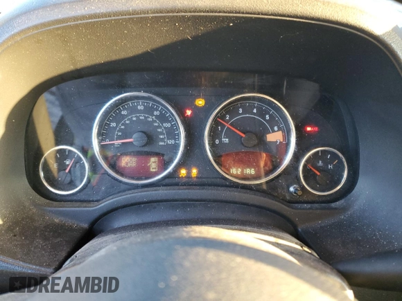 2011 Jeep Patriot Latitude X with VIN 1J4NF4GBXBD127718, listed as a Copart auction lot 89150475 with 162,186 mi miles and Salvage Title. Bid and sale history available at DreamBid. Image 9.