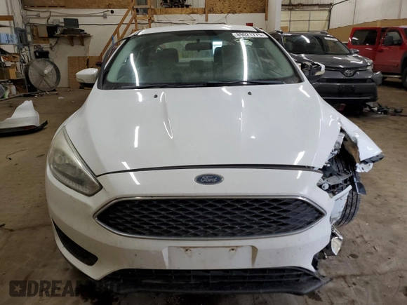 2015 Ford Focus SE z VIN 1FADP3F20FL241951, wystawiony jako Copart lot #89021775 z przebiegiem 91 698 mil mil oraz Szkoda całkowita • Salvage title. Historia ofert i sprzedaży dostępna na DreamBid. Obrazek 5.