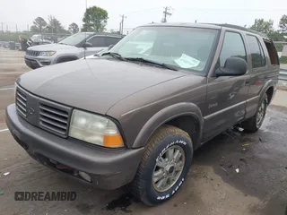 1998 Oldsmobile Bravada z VIN 1GHDT13W6W2727777, wystawiony jako IAAI lot #42103153 z przebiegiem 187 176 mil mil oraz . Historia ofert i sprzedaży dostępna na DreamBid. Obrazek 2.