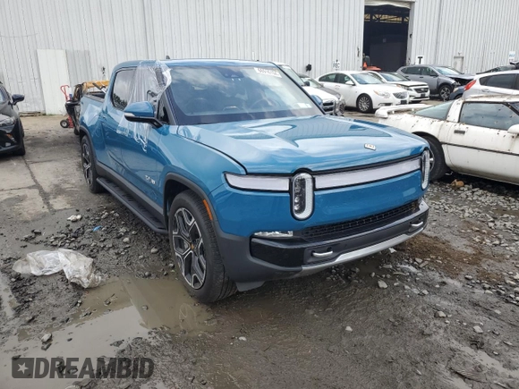 2023 Rivian R1T Adventure with VIN 7FCTGBAA5PN026063, listed as a Copart auction lot 66916194 with Not Provided miles and Salvage Title. Bid and sale history available at DreamBid. Image 4.