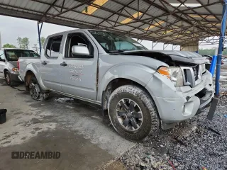 2018 Nissan Frontier SV with VIN 1N6AD0EV6JN744362, listed as a Copart auction lot 58524385 with 117,667 mi miles and Salvage title. Bid and sale history available at DreamBid. Image 4.