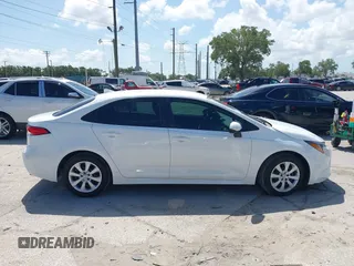 2023 Toyota Corolla LE with VIN 5YFB4MDE1PP058810, listed as a IAAI auction lot 42009318 with 10,950 mi miles and . Bid and sale history available at carsss.com. Image 13.