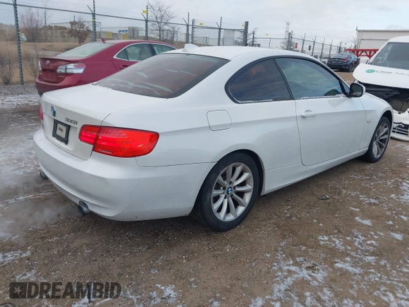 2011 BMW 3 Series 335i xDrive with VIN WBAKF9C54BE619741, listed as a IAAI auction lot 41561412 with 118,813 mi miles and . Bid and sale history available at DreamBid. Image 4.