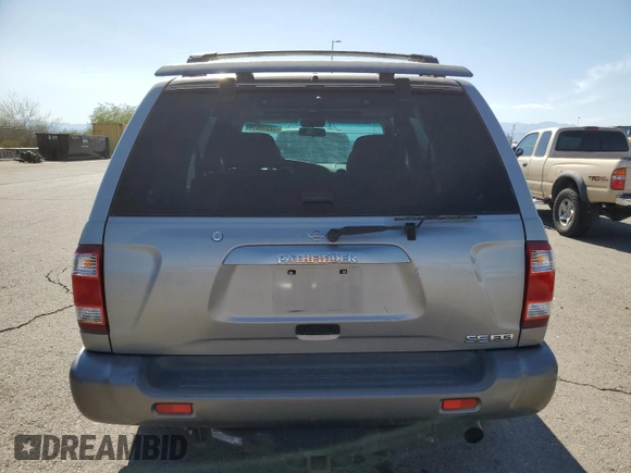 2001 Nissan Pathfinder SE с VIN JN8DR07Y71W520959, выставлен на аукционе Copart как лот 72599614 с пробегом 186 415 миль миль и Списание • Salvage title. История ставок и продаж доступна на DreamBid. Изображение 6.