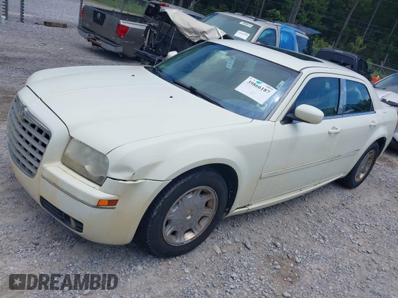 2006 Chrysler 300 Touring with VIN 2C3KA53G96H350490, listed as a IAAI auction lot 41319162 with 209,159 mi miles. Bid and sale history available at carsss.com. Image 2.