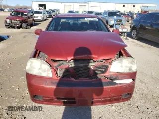 2005 Suzuki Forenza S z VIN KL5JD56Z45K116900, wystawiony jako Copart lot #85151464 z przebiegiem 95 668 mil mil oraz Szkoda całkowita • Salvage title. Historia ofert i sprzedaży dostępna na DreamBid. Obrazek 5.
