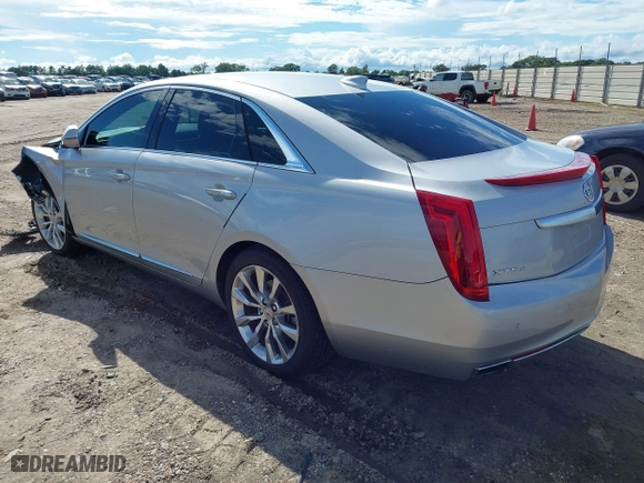 2015 Cadillac XTS Luxury with VIN 2G61N5S36F9251701, listed as a IAAI auction lot 40315224 with 99,918 mi miles. Bid and sale history available at carsss.com. Image 3.