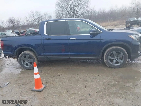 2022 Honda Ridgeline RTL-E with VIN 5FPYK3F72NB036226, listed as a IAAI auction lot 41706285 with 30,869 mi miles. Bid and sale history available at carsss.com. Image 14.