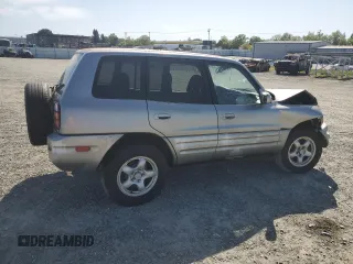 1999 Toyota RAV4 with VIN JT3GP10V5X7053634, listed as a Copart auction lot 52761695 with 236,443 mi miles and Salvage title. Bid and sale history available at DreamBid. Image 3.