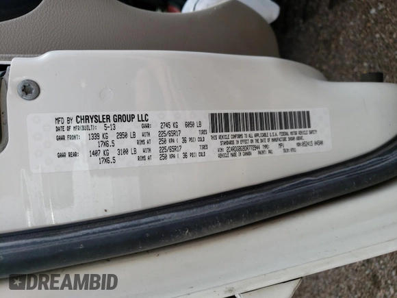 2013 Dodge Grand Caravan SE with VIN 2C4RDGBG9DR772944, listed as a Copart auction lot 56014894 with 193,635 mi miles and Salvage Title. Bid and sale history available at DreamBid. Image 15.