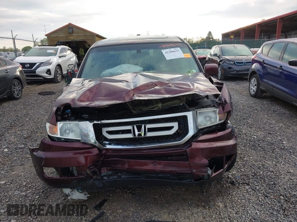 2010 Honda Ridgeline RTL with VIN 5FPYK1F57AB005602, listed as a IAAI auction lot 42208633 with 106,777 mi miles and . Bid and sale history available at DreamBid. Image 12.