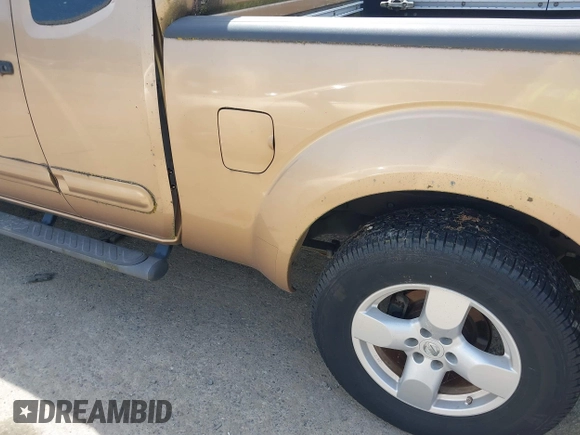 2005 Nissan Frontier LE with VIN 1N6AD06W65C402998, listed as a IAAI auction lot 42438553 with 112,006 mi miles and . Bid and sale history available at DreamBid. Image 6.