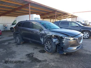 2018 Mazda CX-9 Sport with VIN JM3TCABY8J0203093, listed as a IAAI auction lot 41218241 with 130,832 mi miles and . Bid and sale history available at DreamBid. Image 1.