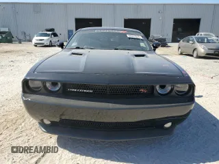 2014 Dodge Challenger R/T z VIN 2C3CDYBT6EH112199, wystawiony jako Copart lot #58023535 z przebiegiem 99 977 mil mil oraz Szkody całkowita. Historia ofert i sprzedaży dostępna na DreamBid. Obrazek 5.