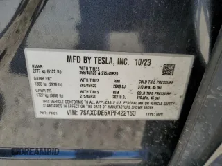 2023 Tesla Model X with VIN 7SAXCDE5XPF422163, listed as a Copart auction lot 52573185 with Not Provided miles and Salvage Title. Bid and sale history available at DreamBid. Image 12.