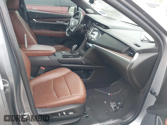 2021 Cadillac XT5 FWD Premium Luxury with VIN 1GYKNCRS5MZ128908, listed as a IAAI auction lot 41919571 with 51,280 mi miles and . Bid and sale history available at carsss.com. Image 5.