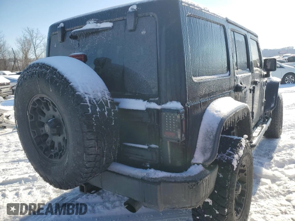 2013 Jeep Wrangler Unlimited Sport with VIN 1C4BJWDG7DL621806, listed as a Copart auction lot 87604805 with 158,885 mi miles and Salvage title. Bid and sale history available at DreamBid. Image 3.