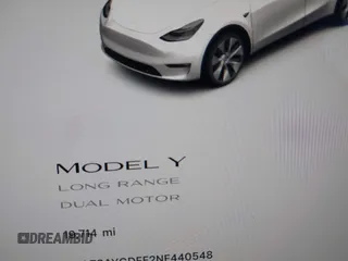 2022 Tesla Model Y Long Range with VIN 7SAYGDEE2NF440548, listed as a IAAI auction lot 41360276 with 19,714 mi miles and . Bid and sale history available at carsss.com. Image 7.