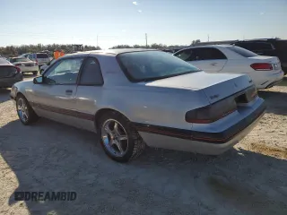 1988 Ford Thunderbird with VIN 1FABP64T3JH145411, listed as a Copart auction lot 78222654 with 143,134 mi miles and Salvage Title. Bid and sale history available at DreamBid. Image 2.