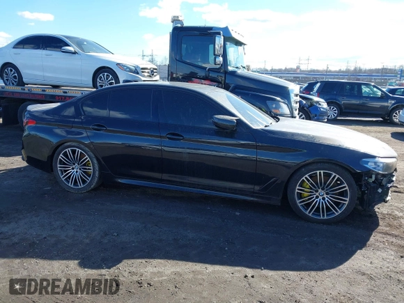 2019 BMW 5 Series 540i xDrive with VIN WBAJE7C54KWD55100, listed as a IAAI auction lot 41476251 with 74,733 mi miles and . Bid and sale history available at carsss.com. Image 13.