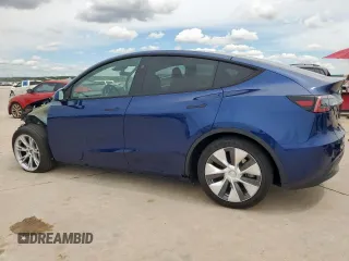 2024 Tesla Model Y Long Range with VIN 7SAYGDEE2RF986014, listed as a Copart auction lot 55791145 with 12,344 mi miles and Salvage title. Bid and sale history available at DreamBid. Image 2.