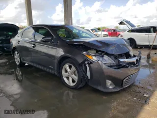 2015 Toyota Avalon Hybrid XLE Touring with VIN 4T1BD1EB4FU038468, listed as a Copart auction lot 62210073 with 166,382 mi miles. Bid and sale history available at carsss.com. Image 4.