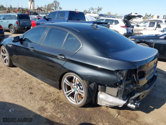 2014 BMW M5 with VIN WBSFV9C56ED097611, listed as a IAAI auction lot 41845196 with 72,215 mi miles. Bid and sale history available at carsss.com. Image 3.