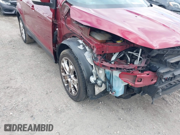2016 Ford Escape Titanium with VIN 1FMCU9JX2GUA89716, listed as a IAAI auction lot 41899786 with 85,474 mi miles and . Bid and sale history available at DreamBid. Image 17.