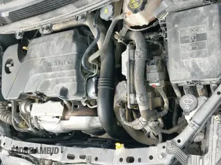 2018 Chevrolet Cruze LT z VIN 1G1BE5SM2J7188657, wystawiony jako IAAI lot #43440260 z przebiegiem 173 856 mil mil oraz . Historia ofert i sprzedaży dostępna na DreamBid. Obrazek 24.