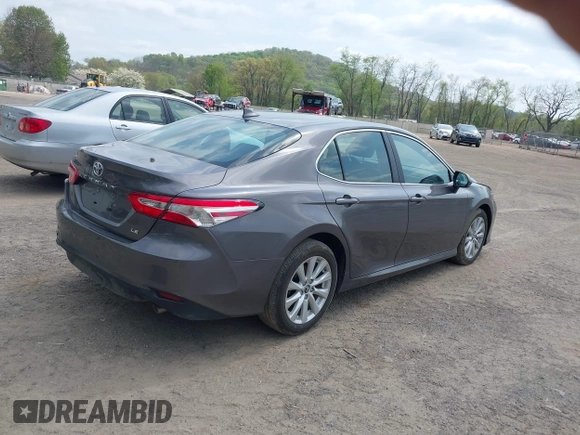 2019 Toyota Camry LE with VIN 4T1B11HK9KU229110, listed as a IAAI auction lot 42133332 with 17,541 mi miles and . Bid and sale history available at DreamBid. Image 4.
