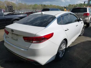 2016 Kia Optima LX with VIN KNAGT4L37G5074853, listed as a IAAI auction lot 41950918 with 151,111 mi miles. Bid and sale history available at carsss.com. Image 4.