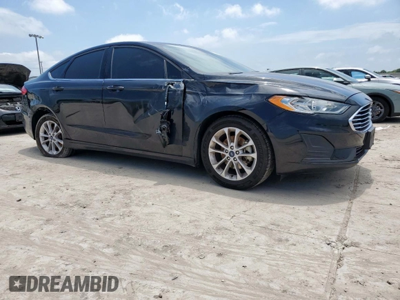 2020 Ford Fusion SE with VIN 3FA6P0HD0LR147541, listed as a Copart auction lot 59959575 with 90,308 mi miles and Salvage title. Bid and sale history available at DreamBid. Image 4.