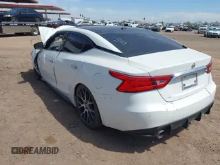 2016 Nissan Maxima SV with VIN 1N4AA6AP8GC379439, listed as a IAAI auction lot 42183728 with 107,857 mi miles and . Bid and sale history available at DreamBid. Image 3.