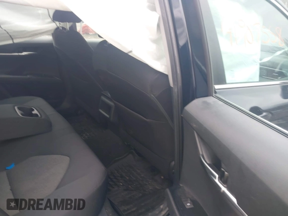 2020 Toyota Camry LE with VIN 4T1L11AK3LU977805, listed as a IAAI auction lot 41907558 with 82,237 mi miles and . Bid and sale history available at DreamBid. Image 8.