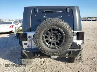 2009 Jeep Wrangler Rubicon with VIN 1J8GA64159L700909, listed as a Copart auction lot 86308954 with 138,065 mi miles and Salvage title. Bid and sale history available at DreamBid. Image 6.